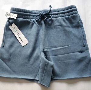 Brand new with tag Aritzia TNA size medium cozy fleece 5 inch shorts.